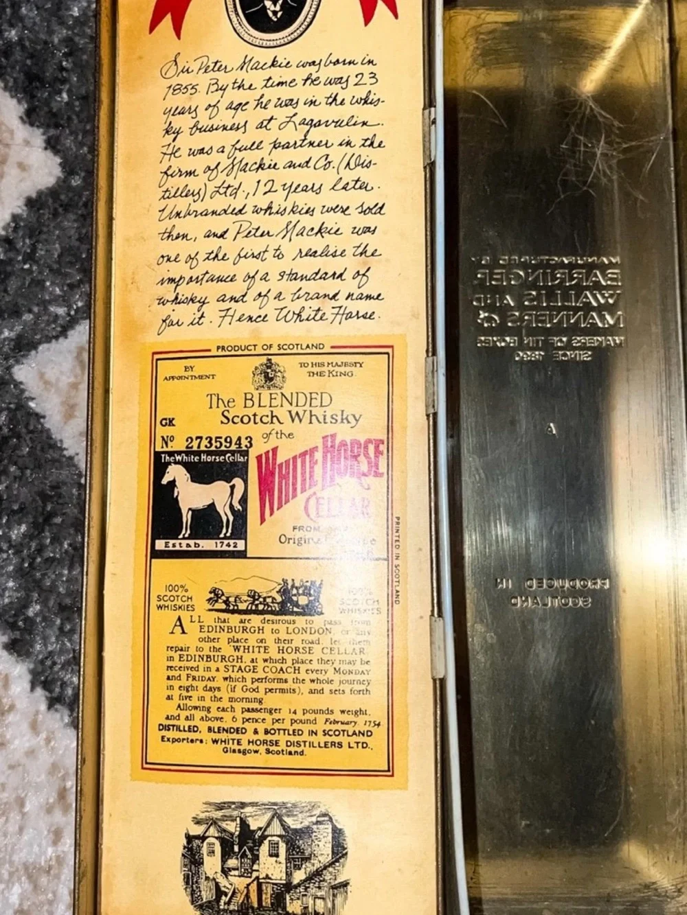 Vintage white horse Scottish whiskey tin. Good condition.